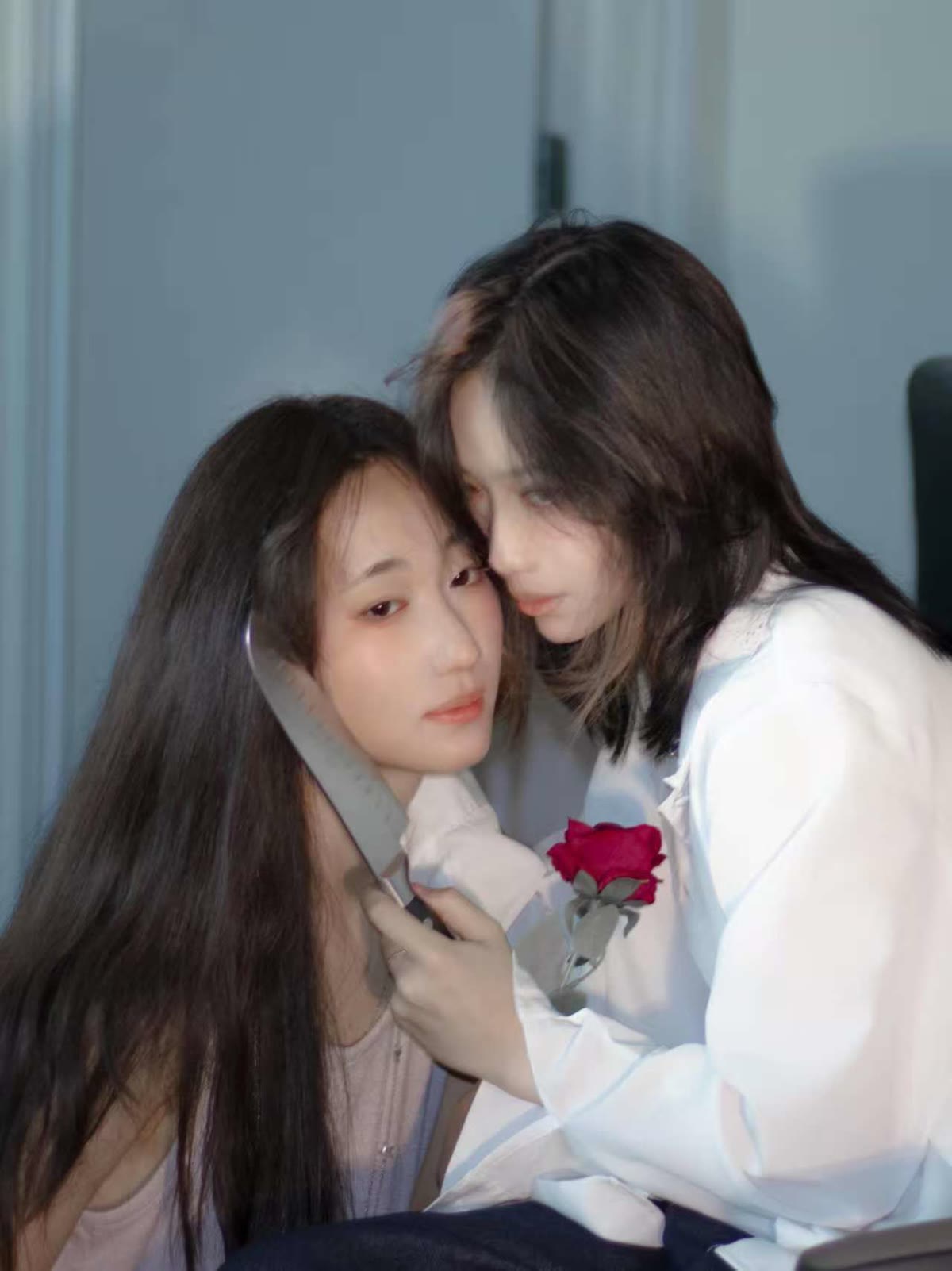 Ottawa sapphic couple portrait with a mirror and red rose
